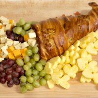 Fruit cheese and a baked cornucopia.