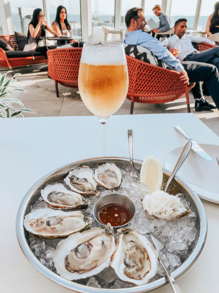 Oysters and beer on a restaurant patio