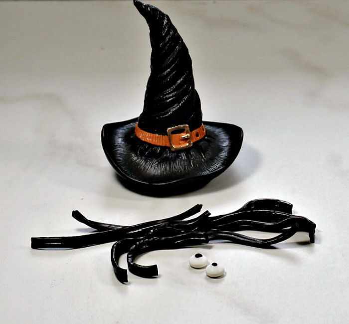 Witch hat, licorice strips and edible eyes.