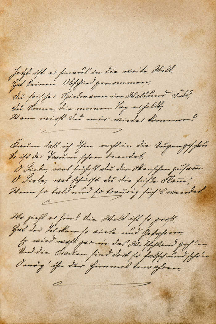 A vintage letter with cursive writing to honor National Handwriting Day.