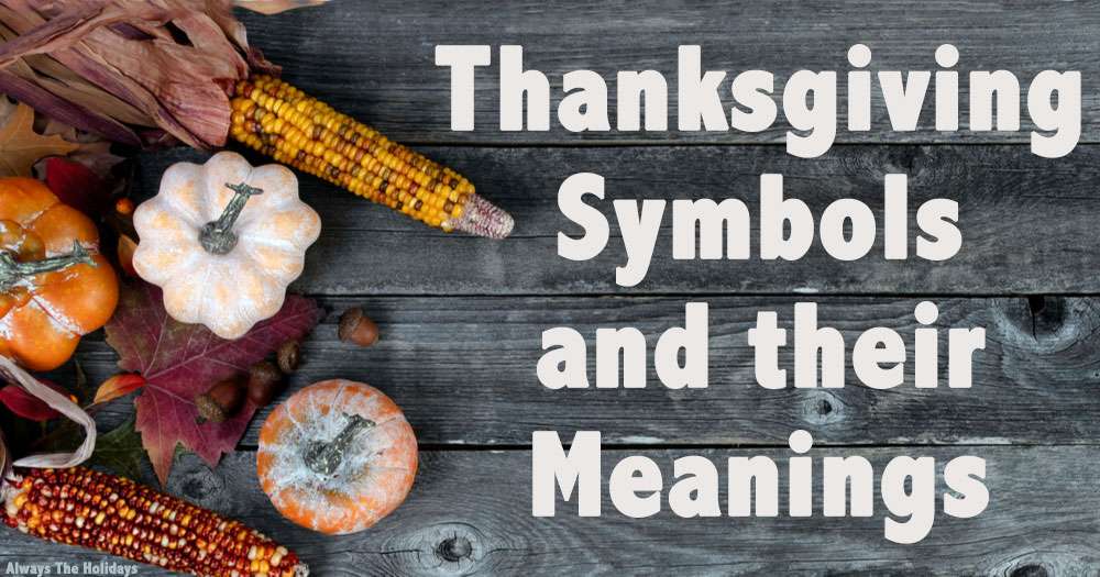 A dark wooden table with gourds, pumpkins, leaves and corn on the left side and text on the right side that says "Thanksgiving symbols and their meanings".