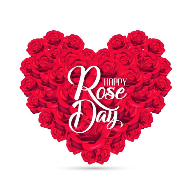 A giant heart of red roses with white text in the center that reads "Happy Rose Day".