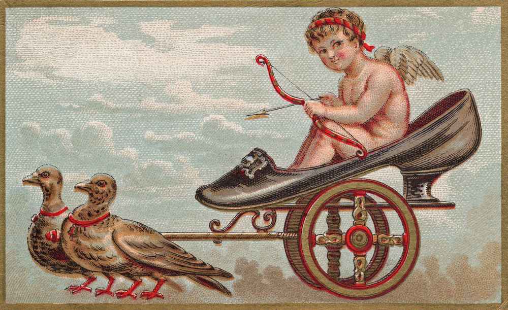 A vintage Cupid in a carriage made of a dark heeled shoe, being pulled by two love birds, symbolizing Cupid god of love.