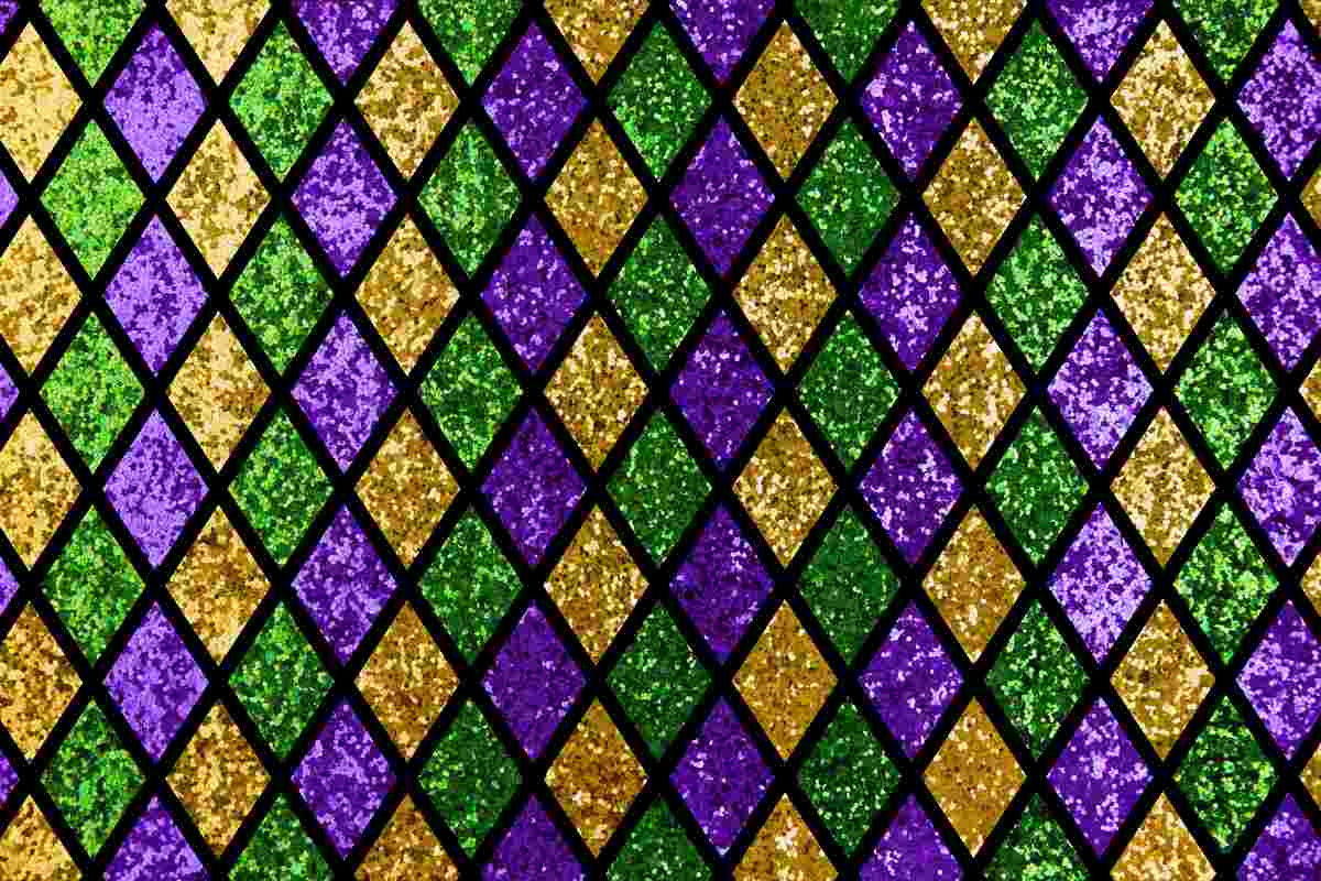 A pattern of diamond shapes in the colors of Mardi Gras, purple, gold and green.