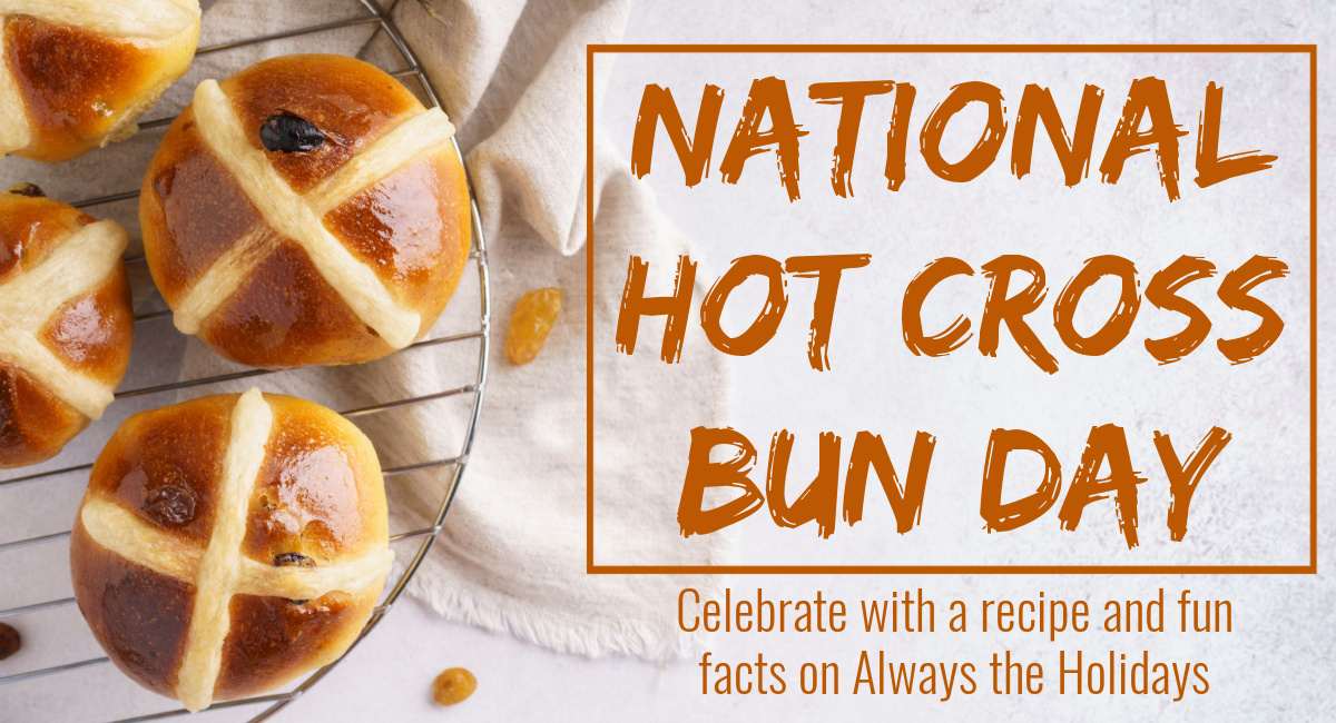 A close up image of a homemade hot cross buns recipe on a cooling rack with a text overlay for National Hot Cross Buns Day.