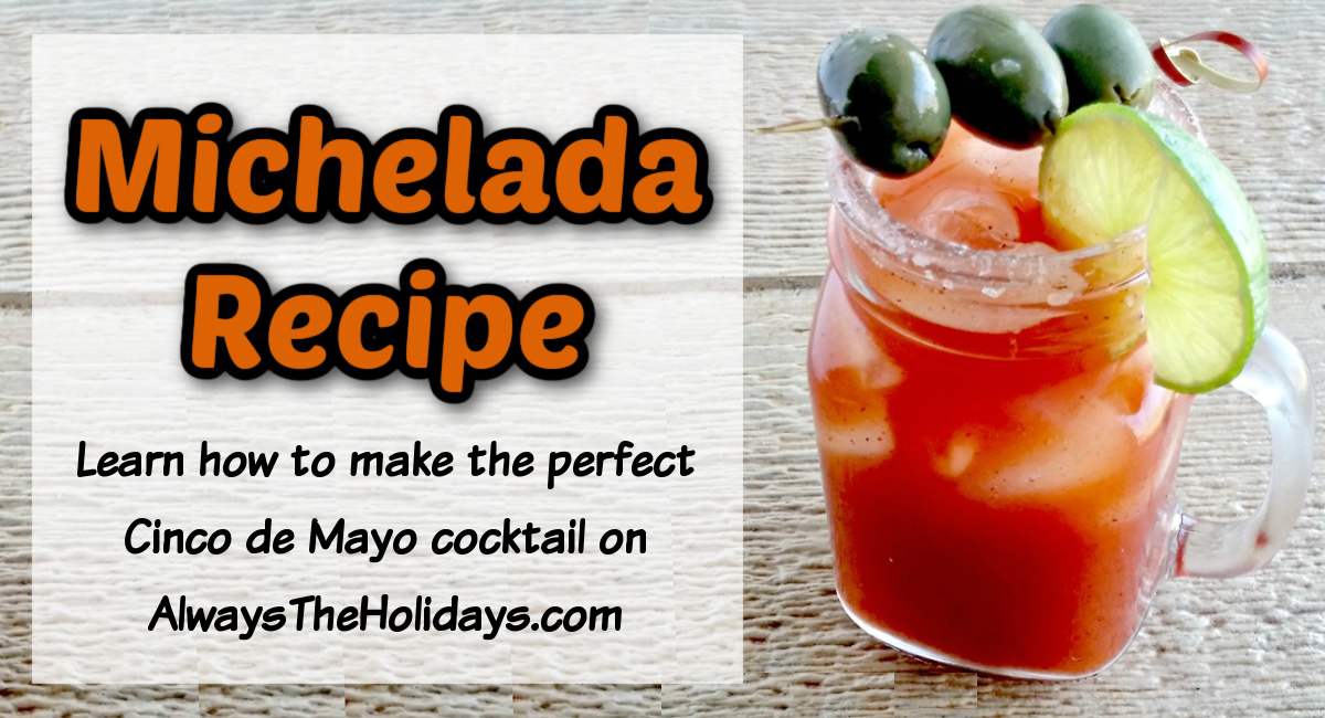 A Cinco de Mayo michelada in a mason jar glass garnished with three green olives and a lime wheel beside a text overlay on the left that says Michelada recipe.