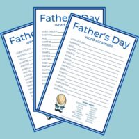Three free printable Father's Day word scrambles fanned out on a light blue background.